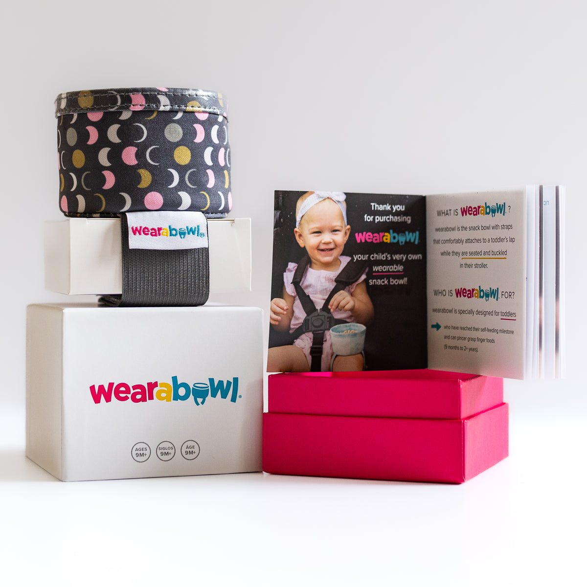 Wearabowl product set including a snack bowl, packaging box, and educational card.